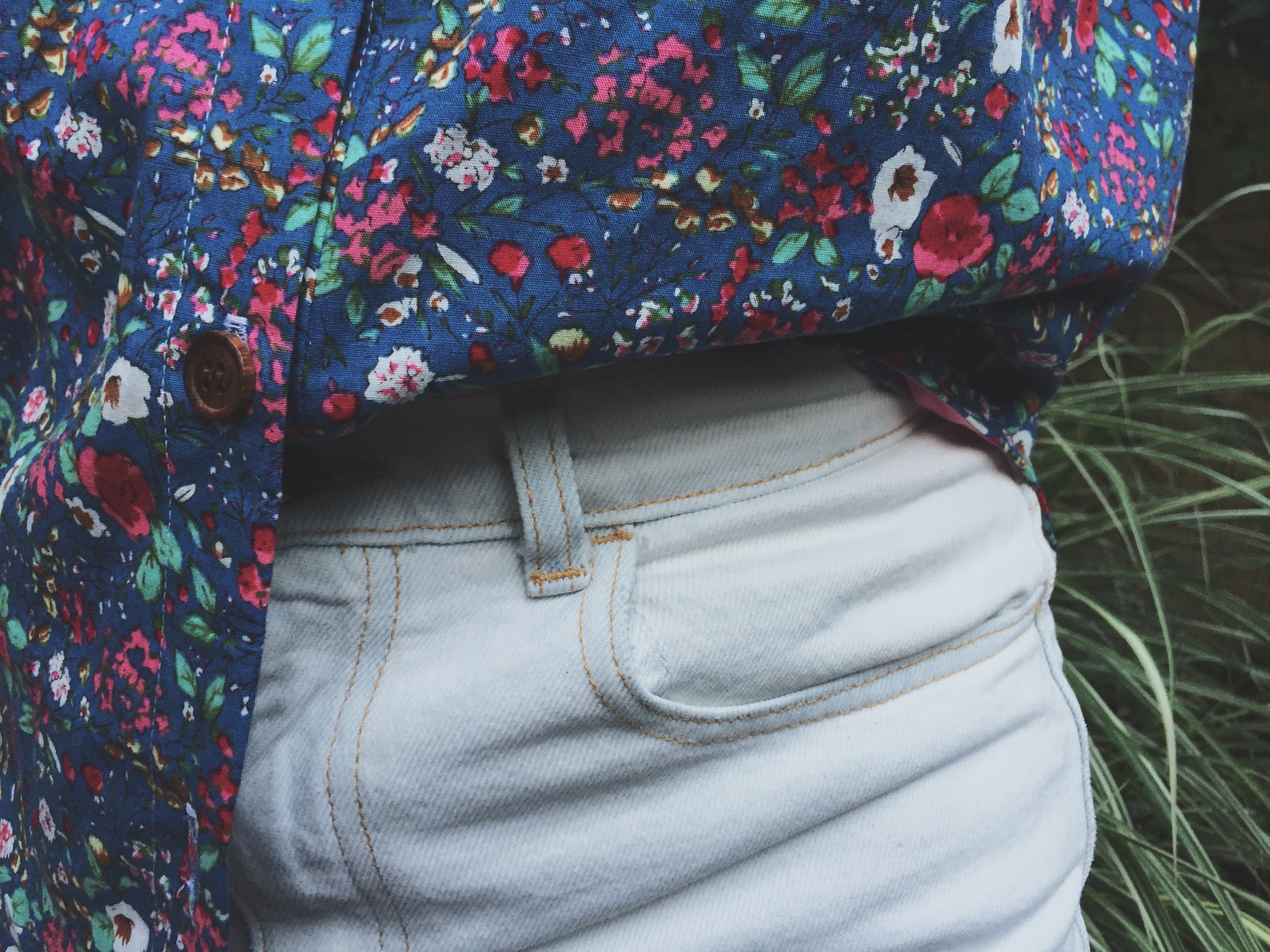closeup of archer button up shirt, wooden buttons