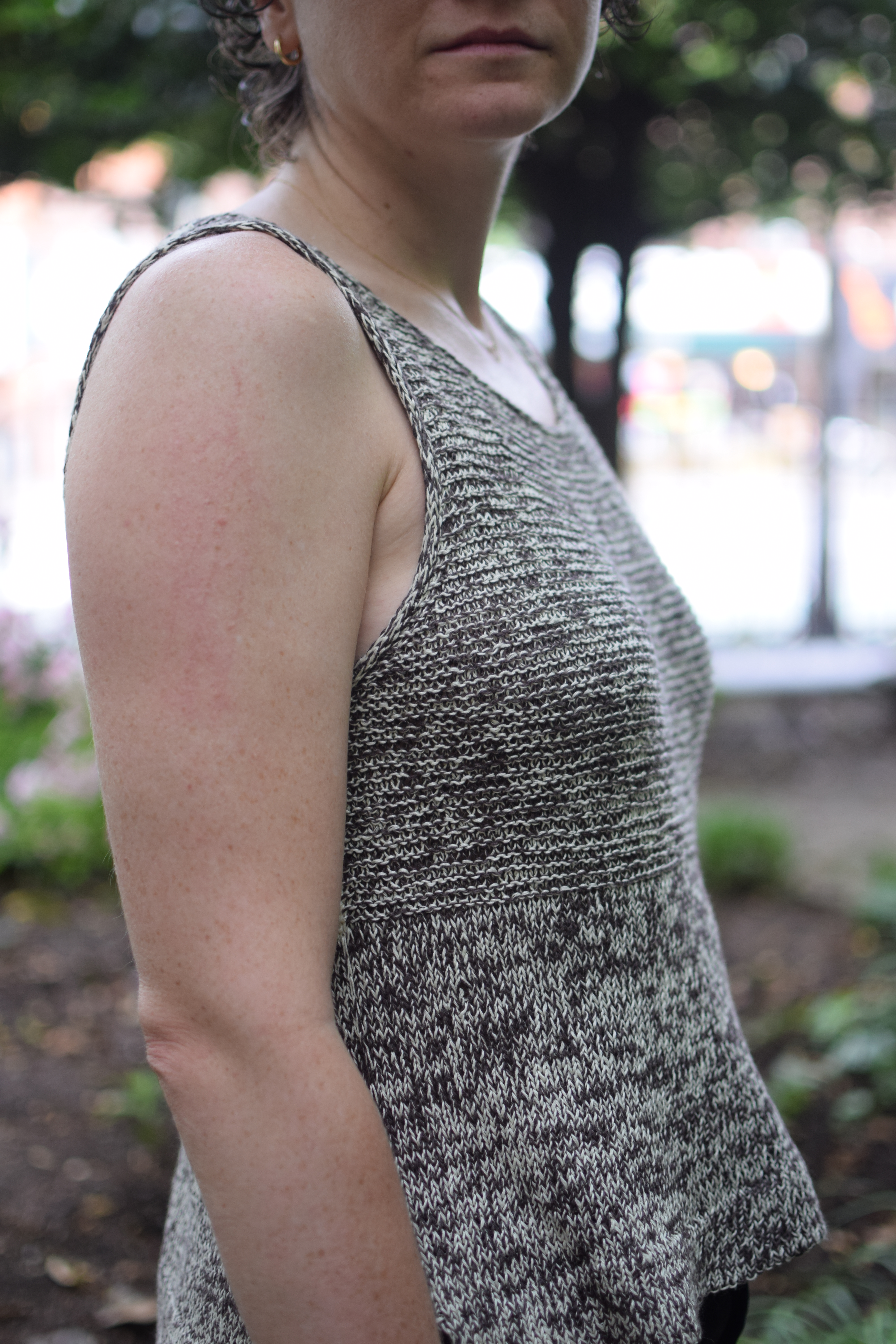 side view of a hand-knitted linen tank top. 