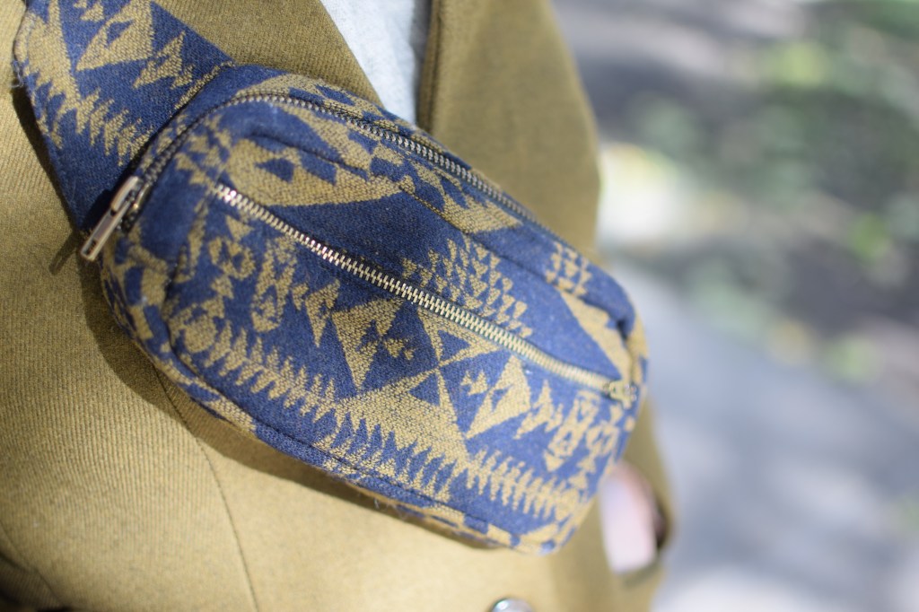 a closeup of a pendleton wool fanny pack.