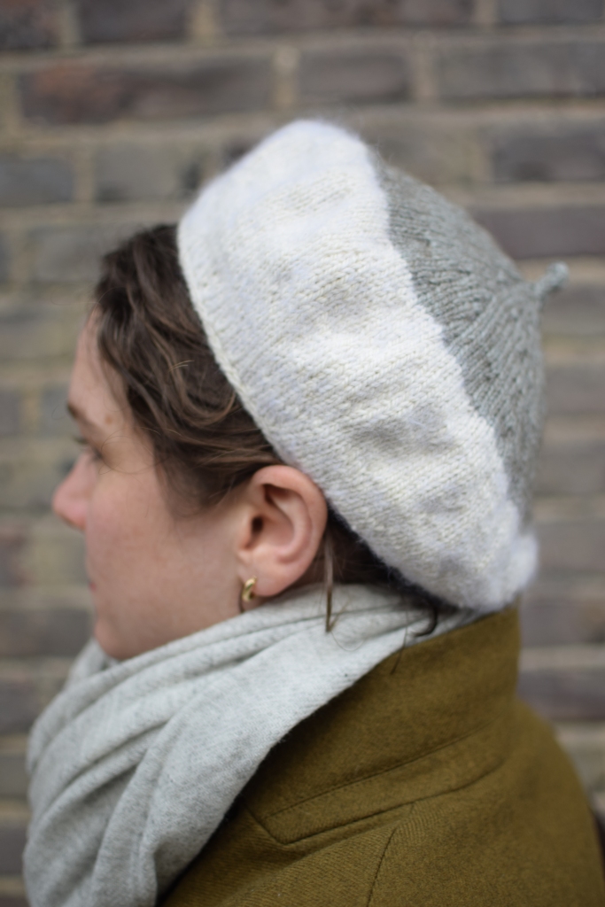 The side view of a beret.